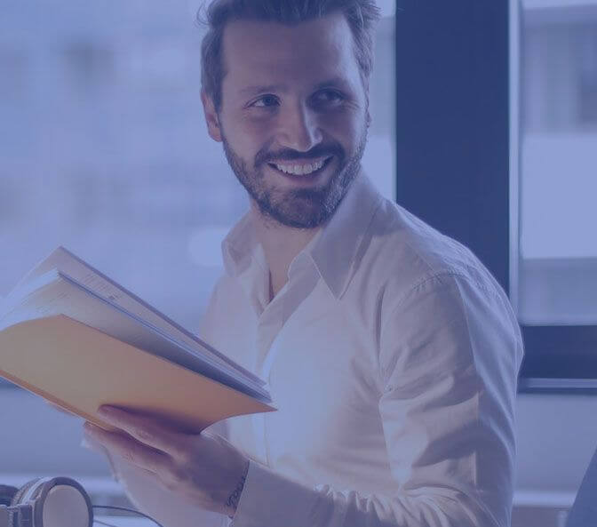 Book in Hand, Smile on Face